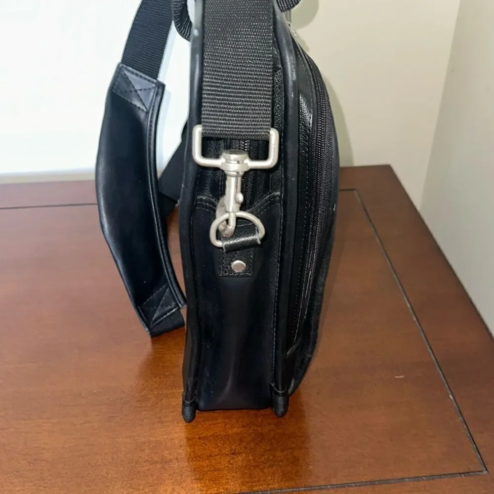 TARGUS Black Tech Padded Faux Leather Laptop Travel Bag with a Crossbody Strap